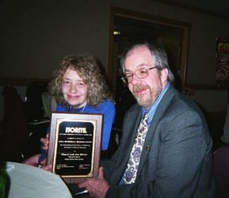 Displaying Jim and Cheryl Miller's award